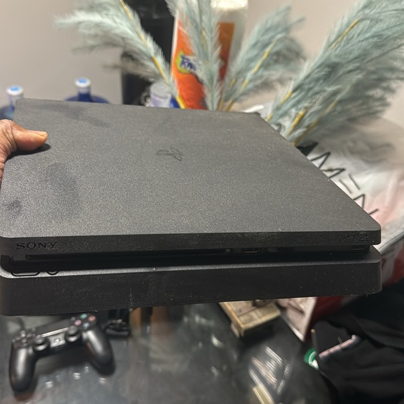 PlayStation 4 with one controller